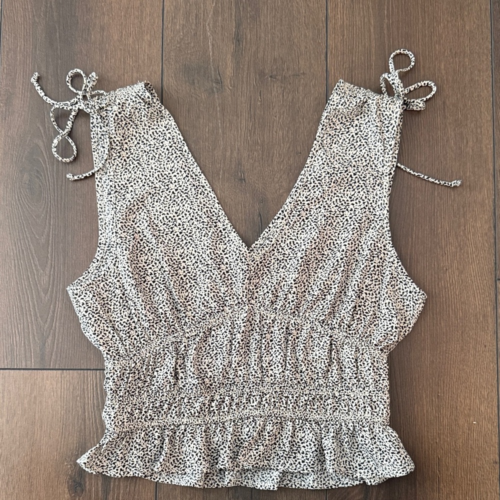 Sienna Sky Cream and Black Sleeveless Blouse